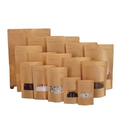 China Recycled Materials Brown Kraft Paper Craft Paper Stand Up Pouches Food Packaging Zipper Bags With Window for sale