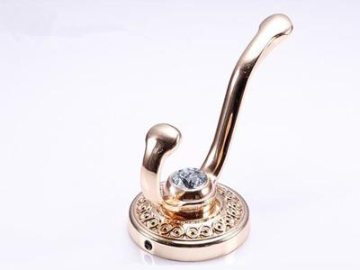 China Crystal Light Coffee Decorative Coat Hooks Elegant Zinc Bag Hangers European Livingroom Jacket Holders for sale