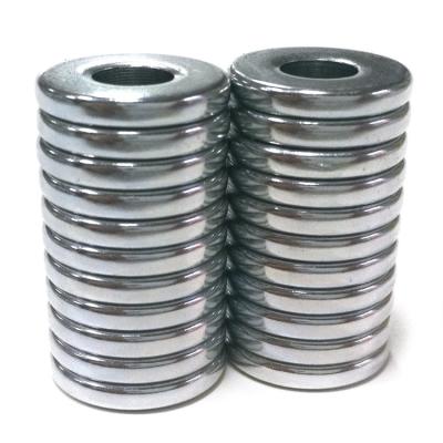 China Industrial Magnet Good Quality Monochrome Silver Cavity Galvanized Ring Magnet For Industry for sale