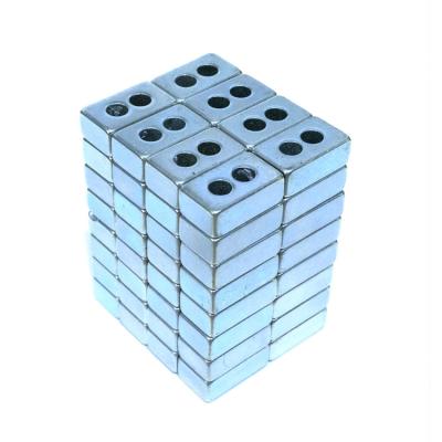 China Industrial magnet two series holing magnets in the middle of rectangle for industrial operation xyct magnet for sale