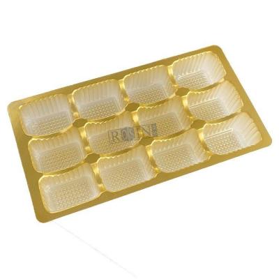 China 12 Cavity Plastic Chocolate Packaging Golden Chocolate Blister Packaging Tray for sale