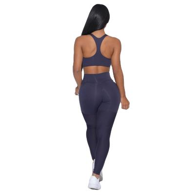 China Two-piece set of new fitness naked matte women's sports suit sports bra high waist pocket breathable tight pants sports for sale