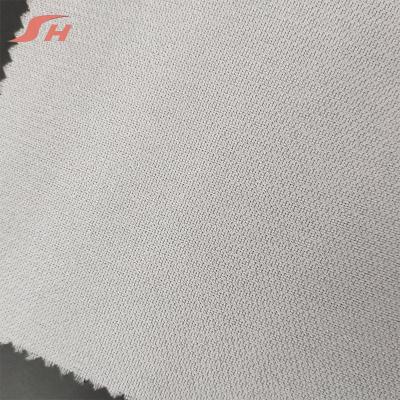 China Adhesive Factory Double Interlining 100% Polyester Woven Dot Interlining for sale