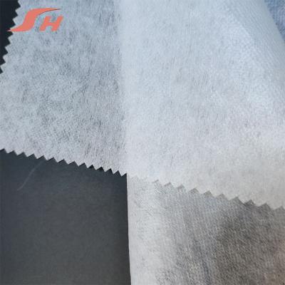 China Cheap Price Custom Color 100% Polyester Adhesive Interlinings And Linings Polyester Fabric Fusible Interlining Clothing Lining PA Or PE for sale