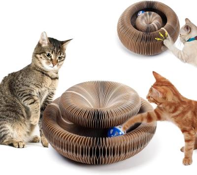 China Cat Organ Toys Funny Donat Design Magic Cat Grinding Claw Toy Foldable Cat Scratcher Scratching Board with Toy Bell for sale