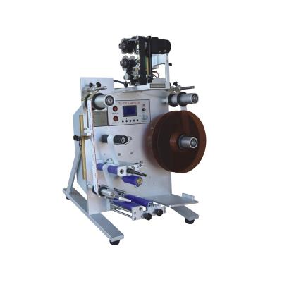 China Food Guaranteed Quality Unique Table Top Label Applicator Round Bottle Labeling Machine for sale