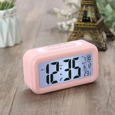 China Multifunctional Intelligent Luminous Smart Temperature Pattern LED Projection Clock Digital Display Perpetual Calendar for sale