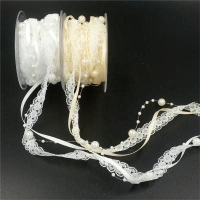 China 50%Polyester Chain and 50%Plastic Pearl 5Meters Decorative Lace Ribbon Wedding Car Decoration Stage Layout Imitation Wedding Birthday Ribbon Cake Ribbon for sale