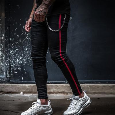 China Waterproof Black Pants High Street Hip Hop Cut Design Rock Revival Mens Jeans Tight Chains Mens Jeans 2023 for sale