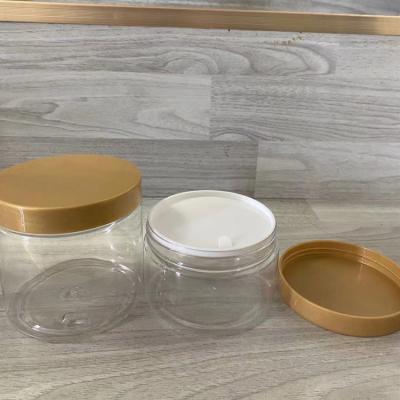 China Clear Cosmetic PET Storage Container 200ml 500ml Plastic Cosmetics Jar With Plastic Screw Cap for sale