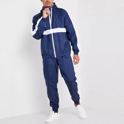 China Breathable Pulser Suits Polyester Wholesale Sportswear Patchwork Tracksuit Men Running Sets for sale