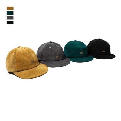 China Leather Strap COMMON Buckle Flat OEM Bill Fit Unstructured Corduroy Snapback Cap for sale