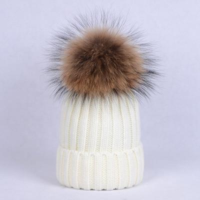 China Customized COMMON embroidered winter women acrylic waffle knit white beanie hat with raccoon pom pom for sale