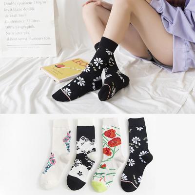 China Happy border hot sale medium tube women's cotton socks personality autumn and winter new products socks flower women's socks for sale