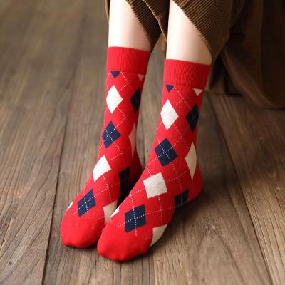 China All-matching Red socks women's wholesale autumn and winter mid-tube cotton New Year's Christmas socks Benming year to make a fortune stepping for sale