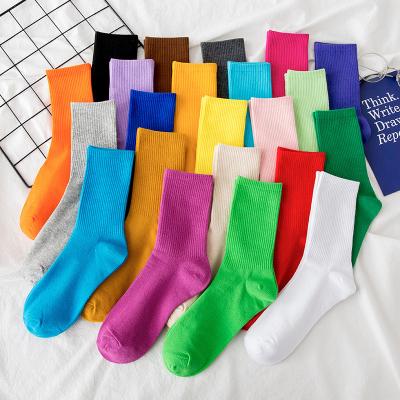 China Simple color women's socks fashion Korean version cotton spring net red socks and autumn all-match street stock solid color group socks for sale