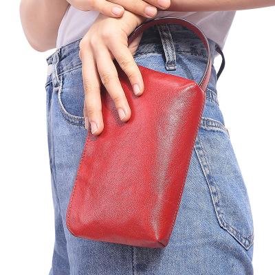 China Fashion PORTABLE genuine cowhide leather material women's clutches pinch frame clutch bag with zipper all seasons for sale