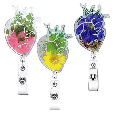 China ABS Plastic Badge Reel Custom Dried Pressed Flower ID Badge Reel Floral Daisy Resin Hearth Badge Holder Work Badge Gfit for Doctor Nurse for sale