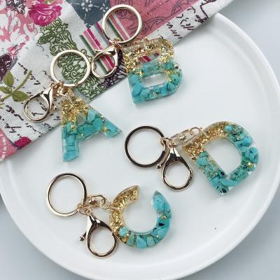 China Decoration.Souvenir.Gifts.Bag Factory Wholesale Customized 26 Letters Resin Keychain Turquoise Crafts Promotional Items for sale