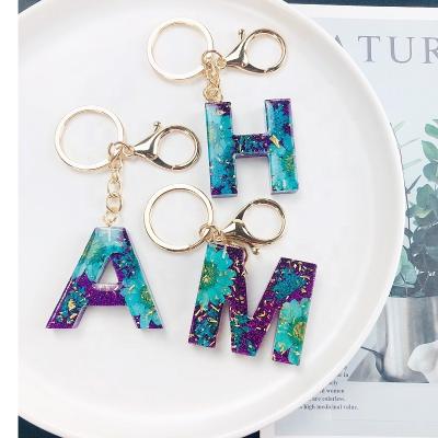 China Metal Factory direct sales resin key pendant real flower handmade bag pendant multifunctional decorative pendant for sale