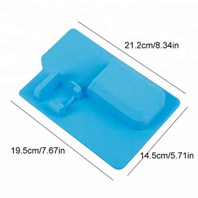 China Sustainable Creative Wall Mounted Razor Toothpaste Holder Silicone Suction Toothbrush Holder for sale