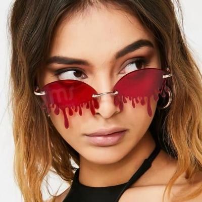 China Wholesale Lightweight Unique Colorful Metal Women Eyewear Women Teardrop Glass New Rimless Sunglasses Ladies for sale