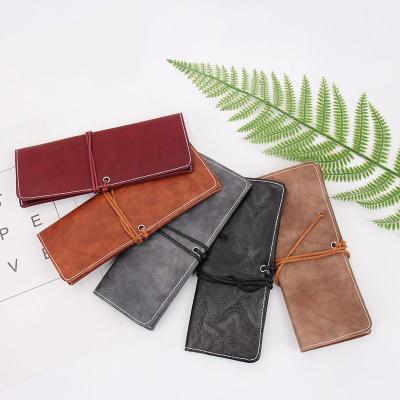 China 2021 Dustproof Sunglasses Case Retro Solid Color Strap Bag Soft Women's Handmade Eyeglass Cases for sale