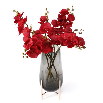 China High simulation feeling moisturizing living room flower arrangement pieces artificial flower butterfly orchid film simulation flower for sale