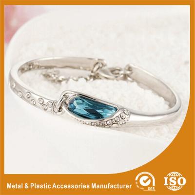 China Fashion Thin Metal Bangles Bracelets With A Blue Stone 18K Gold Jewelry for sale