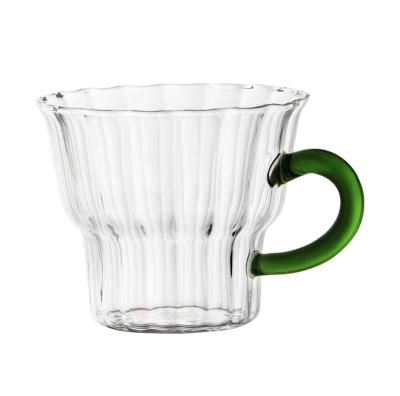 China Sustainable Custom Made Hand-blown Heat-resistant Clear Striped Glass Tea Mug with Colored Handle for sale