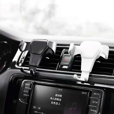 China Flexible Gravity Car Phone Holder Car Air Vent Clip Mount Universal Mobile Phone Holder Cell Phone Holder Stand for sale