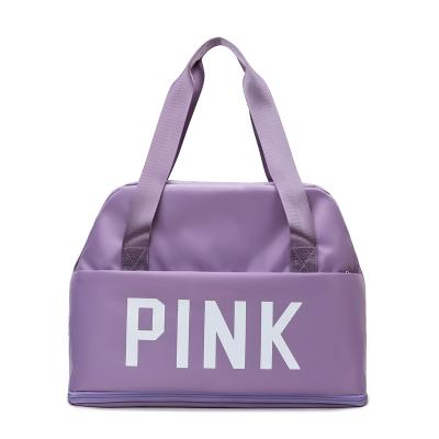 China Shopping 2022 Custom Logo Travel Sports Gym Bag Ladies Bag Women Pink Overnight Designer Duffle Bag Gym Yoga Bag Mini Tote Duffel Bag for sale