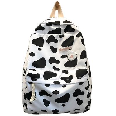 China 2022 Waterproof Customized University Student Milk Cow Fashion School Mochilas Escolares School Backpack Bag Lightweight Female Book for sale