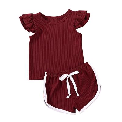 China Wholesale Anti-Shrink Baby Clothing Set Short Sleeves Cotton Ruffled Ribbed Baby Clothing Set for sale