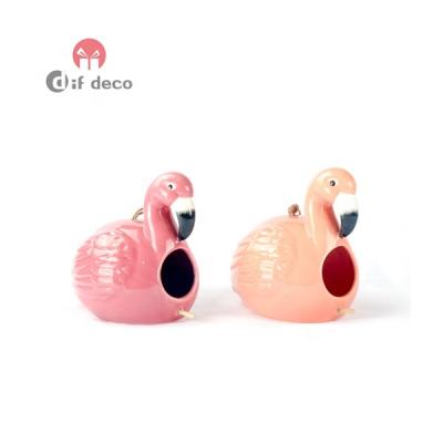 China New Ceramic Dog Bird Carrier Bag Outdoor Style Hanging Pet Houses Flamingo Design For Garden Decoration for sale