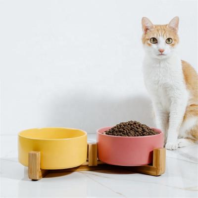 China Non-automatic Tangled Multi Colors Pet Cat Dog Maker Ceramic Bowl with Wooden Stand for sale