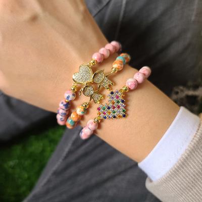 China BN2050 Trendy Rainflower Stone Beaded 18k Gold CZ Love Heart Micro Paved Boy And Girl Bracelets For Ladies for sale