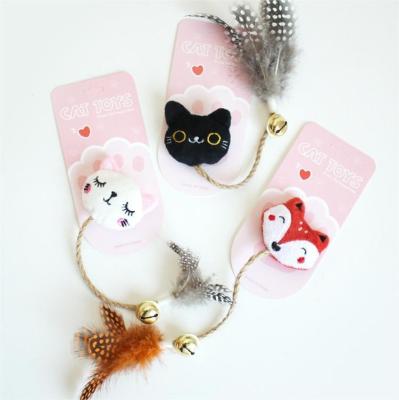 China 2023 Viable New Custom Cat Plush Durable Chewing Toy Bell Feather Toy Fox Cat Character Black White Cat Supplies for sale