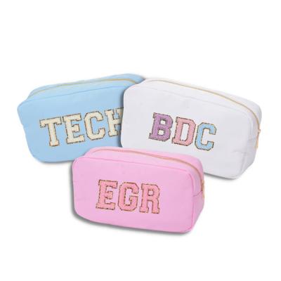 China Reusable Low Price Nylon Cosmetic Bag With Large Letter Patches Embroidery PVC Chenille Toiletry Case Custom Clear Makeup Bag Waterproof for sale