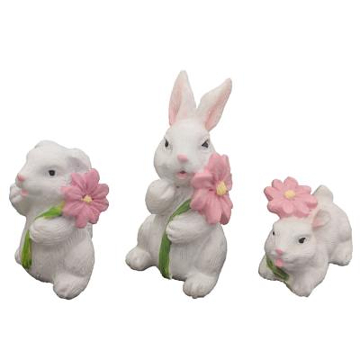 China Europe Spring Fairy Garden Miniatures Lovely White Resin Mini Rabbit With Pink Flower for sale