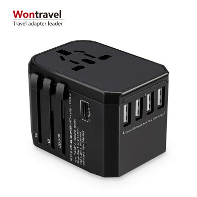 China Universal Travel Mode Portable World Travel Adapter with Four USB and Type-C USB Smart Charger Socket Electrical Outlet for sale