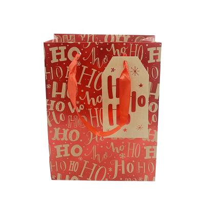 China Recyclable Most Popular 4 Colors Gift Paper Bag Merry Christmas Custom Carrier Packaging White Card Toted Handbags for sale