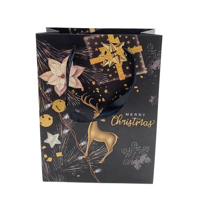 China Customization Recyclable Merry Christmas Paper Bag Logo In Card Carrier Black Printing Stock White Cartoon For Gift Packaging Bags for sale