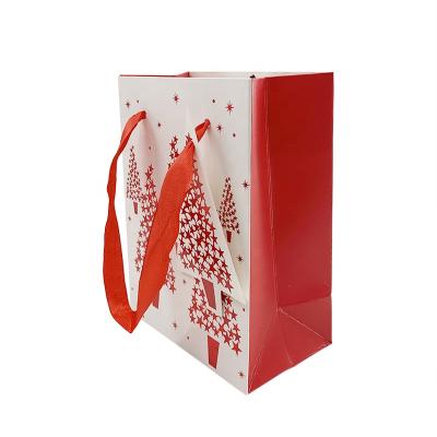 China Recyclable Packaging Customization Merry Christmas Paper Bag Logo Printing White Card Carry Handbags For Gift for sale