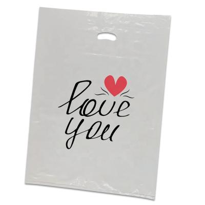 China Customized Die Cut Heavy Duty Plastic Handle Bags Moisture Proof Shopping Bag With Logo for sale