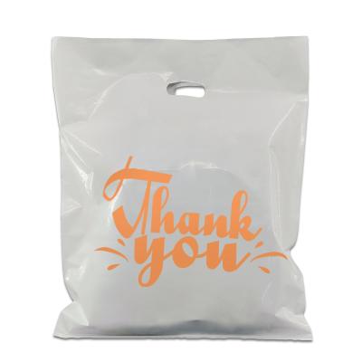 China Custom Die Cut Plastic Bags Handle Moisture Proof Shopping Bag For Clothing, Laundry, Shopping for sale