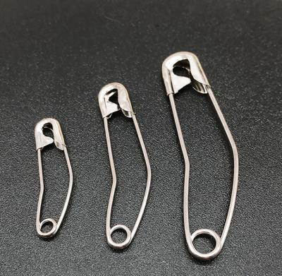 China Iron / Brass Stainless Steel Wire / Curved Safety Pins Stitching Sprinkler Pins With Plastic Cases for sale