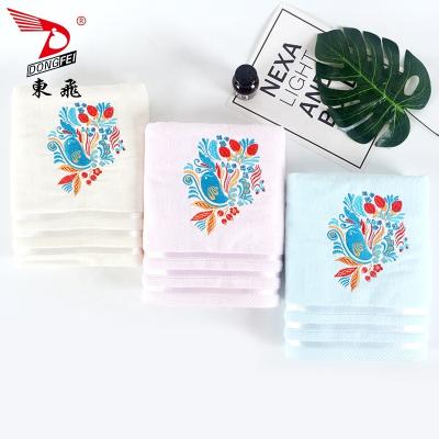 China Disposable Hot Sale Fashion Flower Bird Embroidery Velvet Bath Towel Set Blue Light Color for sale