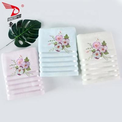 China Bright Disposable Light Color Satin Gear With Flower Clumps Embroidery Velvet Bath Towel Set for sale