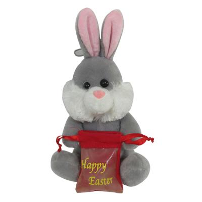 China Toys Gift Easter Holiday Rabbit Plush Toy With Easter Candy Bag Stuffed Toy Bunny for sale